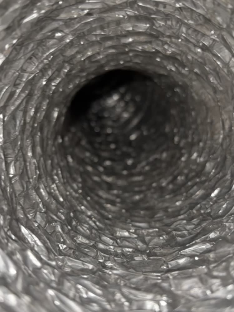 Inside a clean foil dryer duct after cleaning
